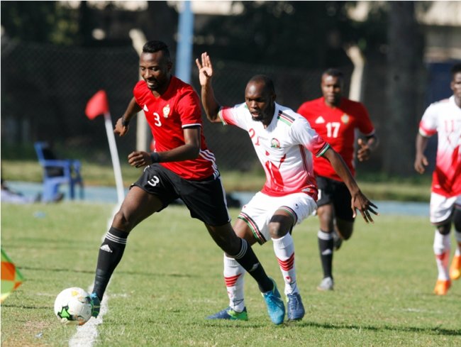 Sabbou Motasem wheels past Kenya's Whyvonne Isuza. (Photo by Shutterspeed)